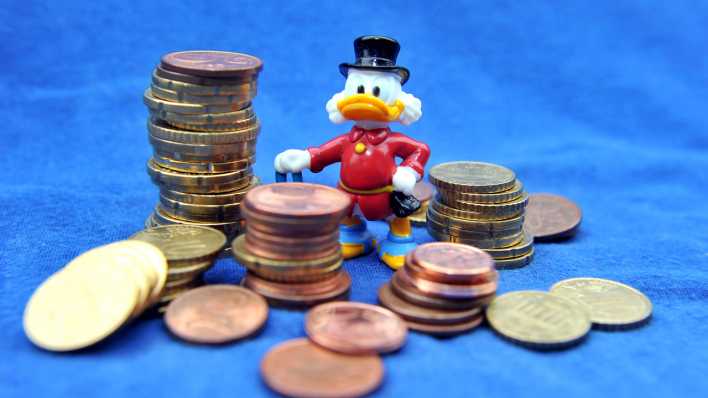 Symbolbild Millionär: Dagobert Duck und Münzen